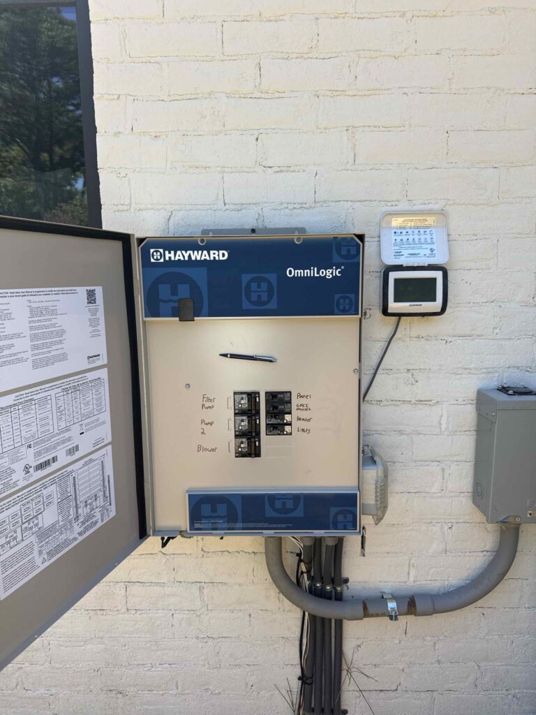 Hayward OmniLogic control system installed on an equipment pad wall